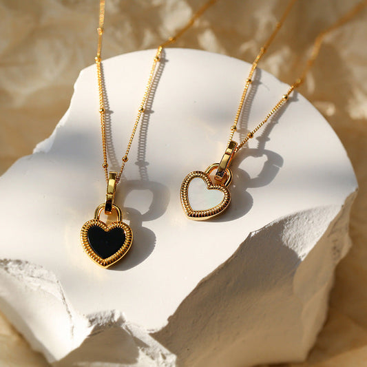 Gold Heart Pendant Necklace with Black and White Design