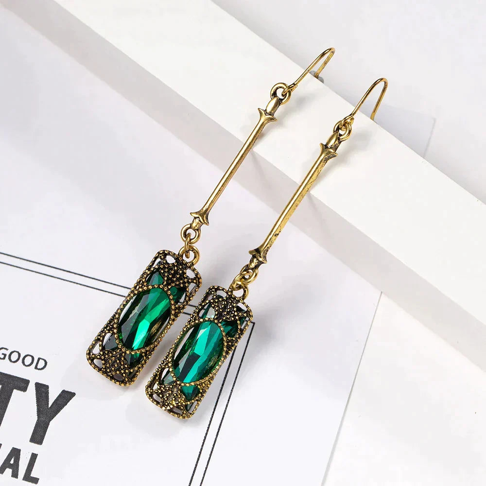 Gold Pendant Earrings with Green Lantern Design