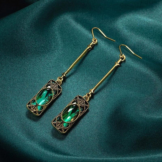 Gold Pendant Earrings with Green Lantern Design