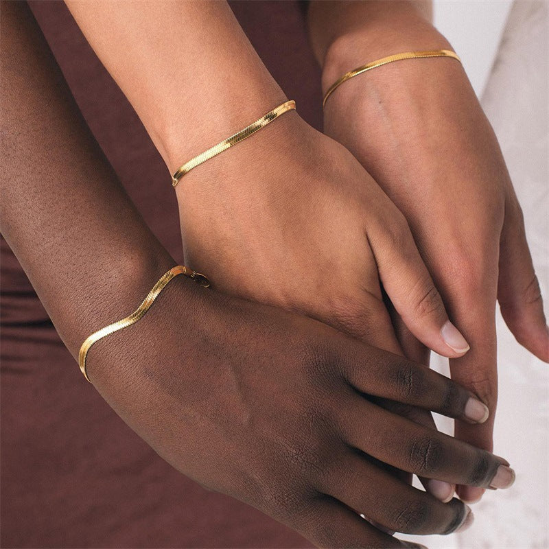 Elegant Herringbone Bracelet in Gold