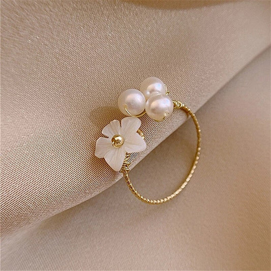 Gold Ring with White Blossom Design and Pearls