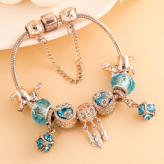 Rose Silver Bracelet with Blue Zirconia Stones
