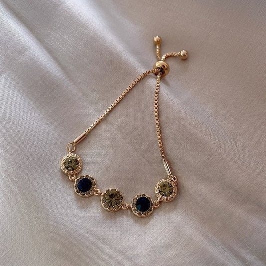 Gold Bracelet with Green Crystals