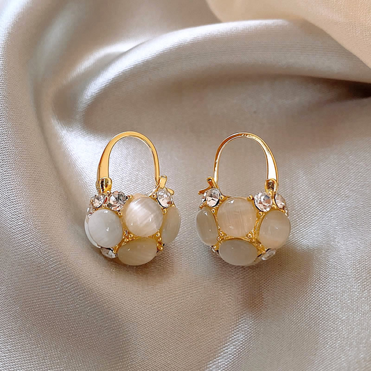 Elegant Pearl Earrings Adorned with Gold Crystals