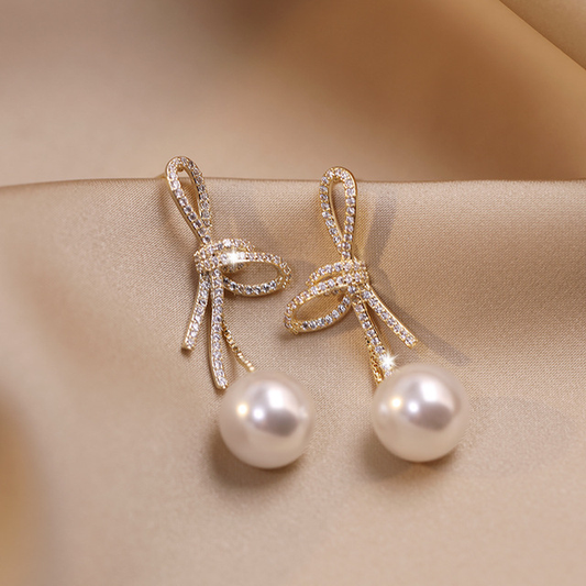Gold Pearl Earrings with Sparkling Bow